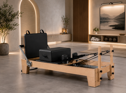 Oakwood Pilates studio reformer with premium wood frame and upholstered carriage for home and studio Pilates training